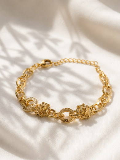 Bracelet Lion Impérial doré avec médaillons grecs et têtes de lion